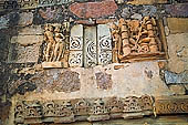 Khajuraho - carvings on the base of  Kandariya Mahadeva temple 